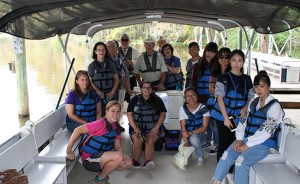 Chinese interns and others on pontoon boat at Shangri La Botanical Gardens, Orange, TX October 11, 2016